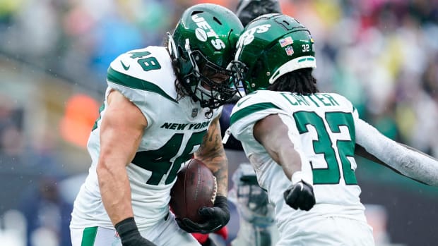FB Nick Bawden celebrates with RB Michael Carter after scoring a TD